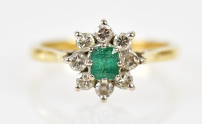 Lot 206 - An 18ct yellow gold diamond and emerald flower...