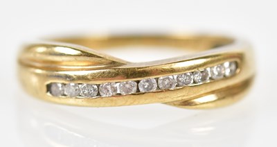 Lot 251 - A 9ct yellow gold diamond set half eternity...