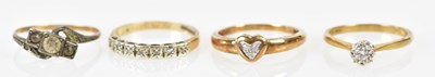 Lot 291 - Four 9ct yellow gold dress rings, combined...