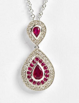 Lot 328 - An 18ct white gold diamond and ruby necklace...