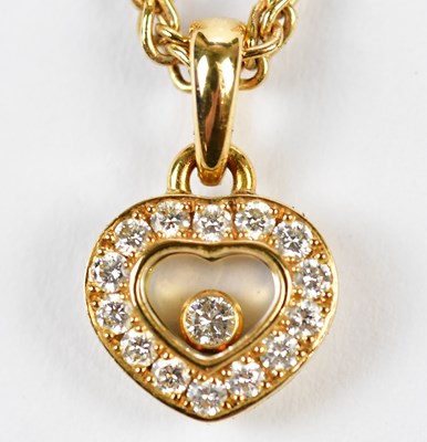 Lot 319 - CHOPARD; an 18ct yellow gold and diamond set...