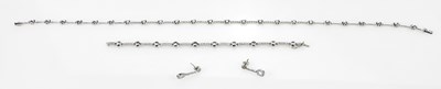 Lot 308 - An 18ct white gold and diamond set suite of...