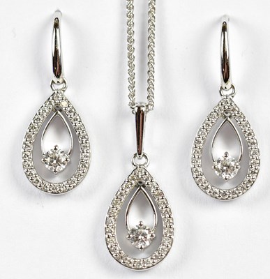 Lot 320 - A suite of 18ct white gold and diamond...