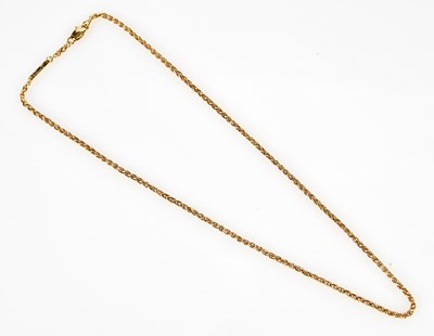 Lot 340 - CARTIER; an 18ct yellow gold chain, signed and...