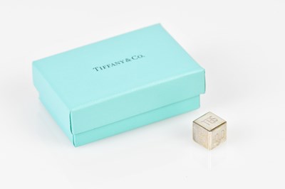 Lot 839 - TIFFANY & CO; a loaded silver die inscribed...