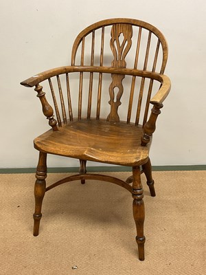 Lot 598 - An oak farm chair with crinoline stretcher,...