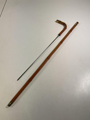 Lot 20 - A bamboo sword stick with stiletto blade-...