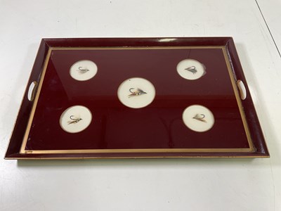 Lot 24 - A glazed tray inset with five fishing flies,...