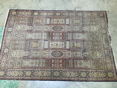 Lot 562 - A Kashmir machine woven rug, 272 x 185cm.