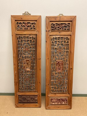 Lot 126 - A pair of decorative carved oriental wooden...