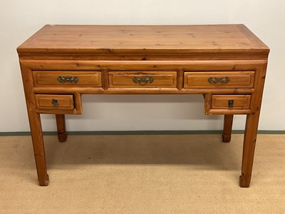 Lot 676 - An Oriental wooden desk with drawers, height...