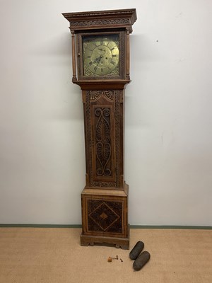 Lot 516 - A longcase oak clock with brass chapter ring...