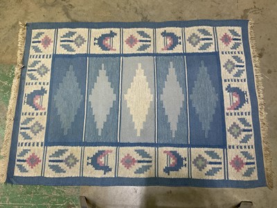 Lot 569 - A blue woven rug, 200 x 139cm