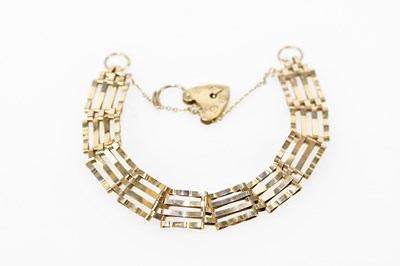 Lot 540 - A 9ct yellow gold four bar gate link bracelet...