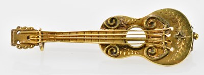 Lot 607 - A 9ct yellow gold brooch modelled as a Spanish...