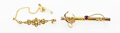 Lot 608 - A 9ct yellow gold bar brooch set with tiny...