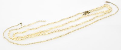 Lot 475 - A two strand cultured pearl necklace with 9ct...