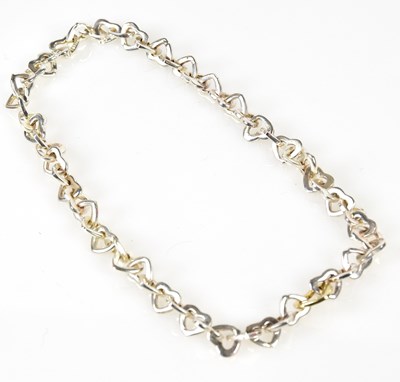 Lot 847 - TIFFANY & CO; silver tone heavy heart link...