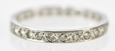 Lot 112 - An 18ct white gold diamond set full eternity...