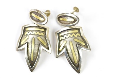 Lot 665 - BOODLES; a pair of silver Aztec designer drop...