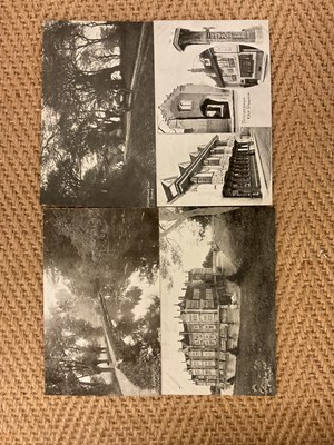 Lot 249 - Two albums of postcards containing...