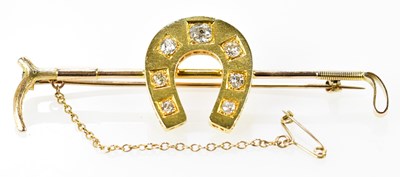 Lot 566 - A large 18ct yellow gold brooch modelled as a...