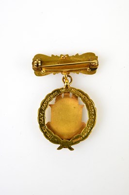 Lot 6 - A large 14ct yellow gold and enamel decorated...