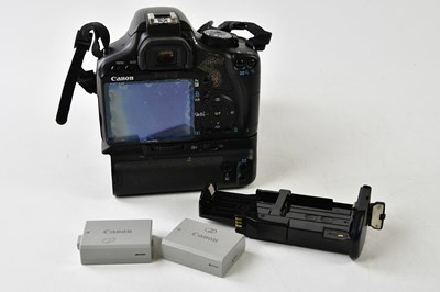 Lot 1411 - CANON; a Canon 450D DSLR camera, with a Canon...