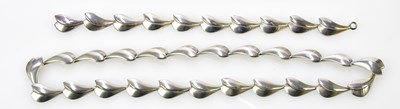 Lot 399 - GEORG JENSEN; a 925 silver lotus necklace and...