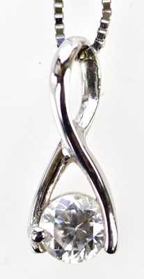 Lot 476 - A small 9ct white gold diamond set pendant,...