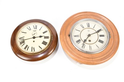 Lot 208 - JUNGHANS; an oak cased circular wall clock,...