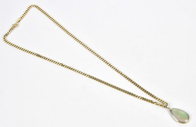 Lot 374 - A 9ct yellow gold flat link chain supporting...