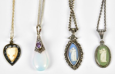 Lot 724 - Four pendants on chains, including Jasperware...