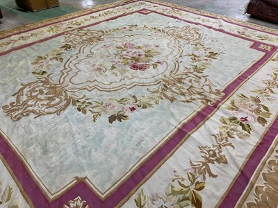 Lot 99 - An early 20th century tapestry floor covering...