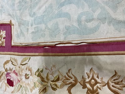 Lot 99 - An early 20th century tapestry floor covering...