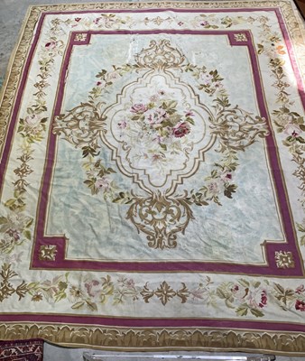 Lot 99 - An early 20th century tapestry floor covering...