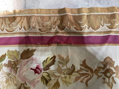 Lot 99 - An early 20th century tapestry floor covering...