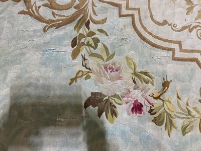 Lot 99 - An early 20th century tapestry floor covering...