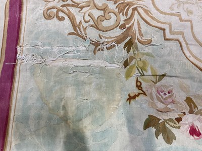 Lot 99 - An early 20th century tapestry floor covering...