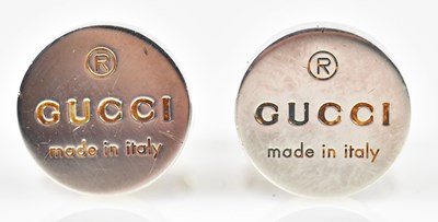 Lot 836 - GUCCI; a pair of hallmarked silver cufflinks...