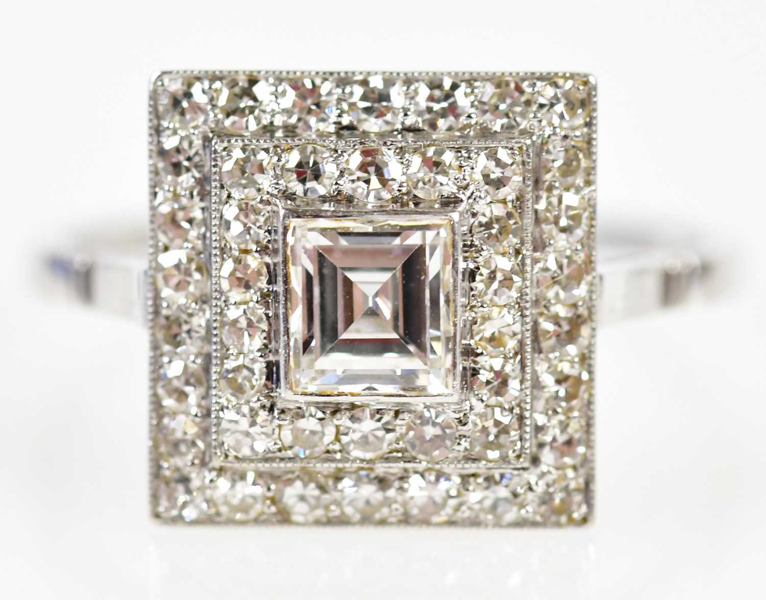 Lot 41 - A white metal and diamond Art Deco ring with...