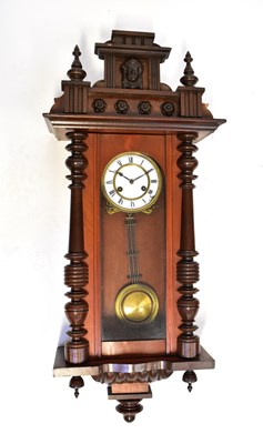 Lot 101 - A Vienna mahogany cased wall clock with...