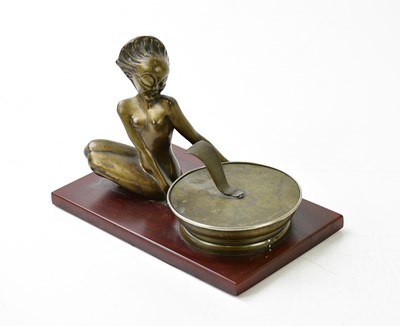 Lot 372 - An Art Deco bronze cigarette tray modelled as...