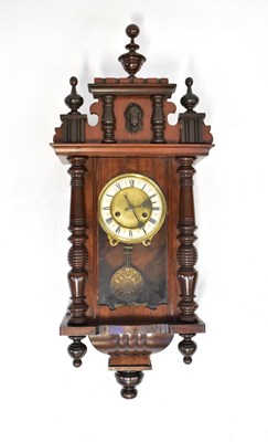 Lot 96 - A Vienna wall clock in a mahogany case, the...