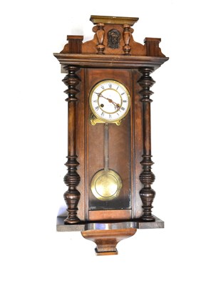 Lot 94 - A Vienna wall clock in a mahogany case, the...