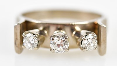 Lot 81 - An 18ct white gold and diamond three stone...