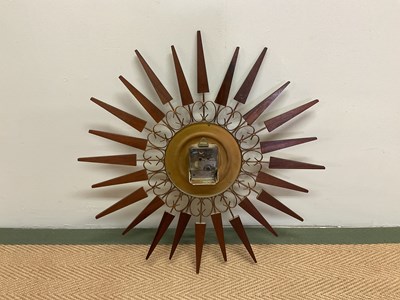 Lot 512 - PAICO; a 1960s starburst wall clock in brass...