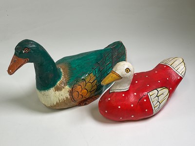 Lot 30 - Two hand painted papier mache decoy ducks, the...
