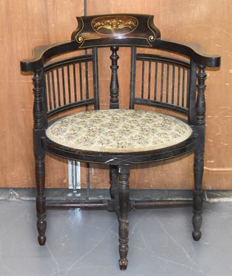 Lot 96 - An Edwardian inlaid bow back elbow chair.