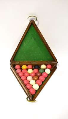 Lot 133 - An oak snooker ball cabinet of triangular form,...